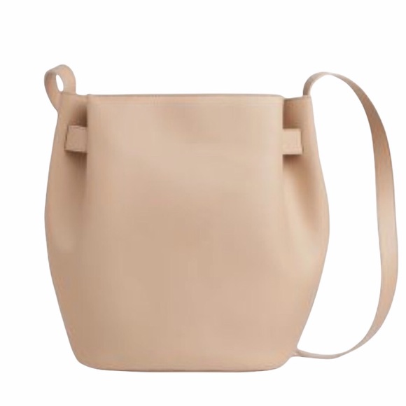 Cuyana Handbags - Cuyana structured cinch crossbody bag in Blush